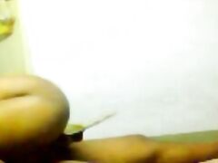 Shy south Indian desi aunty moaning in pleasure while getting fucked hard missionary style wrapping her legs around the mans waist caught on hidden cam video.